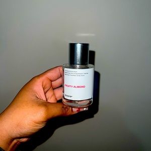 1.7 oz Dossier - Fruity Almond. ✨